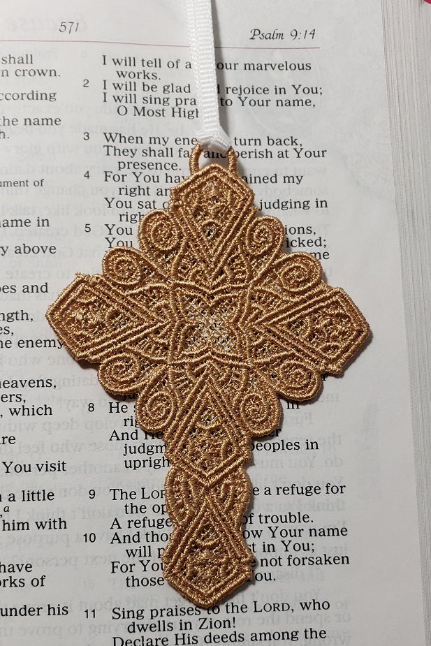 Small Lace Cross bookmark on Bible page