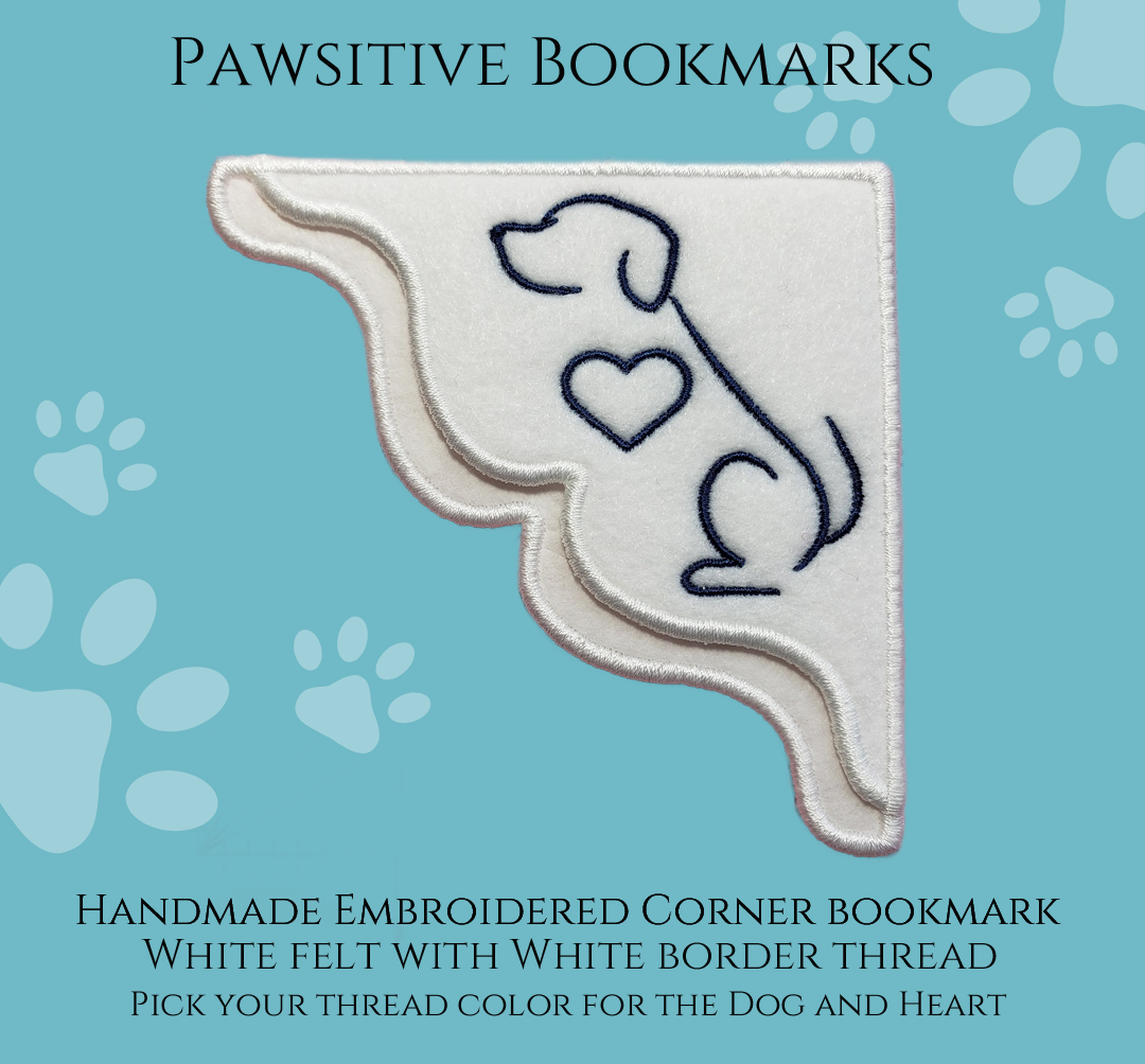 A White Felt Corner Bookmark with an outline image of a Dog  with a Heart with a white border