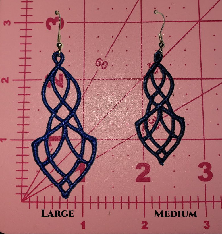 Size comparison of Large & Medium Elegant earrings on a pink cutting mat
